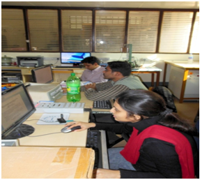 Students working in the lab on PCs